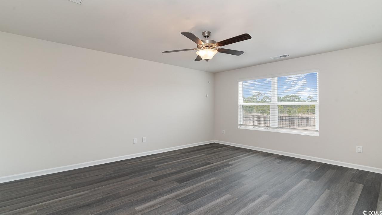 6050 Fuller Rdg Court Conway, SC 29526 - Photo 11 of 22 Empty room featuring dark hardwood / wood-style fl