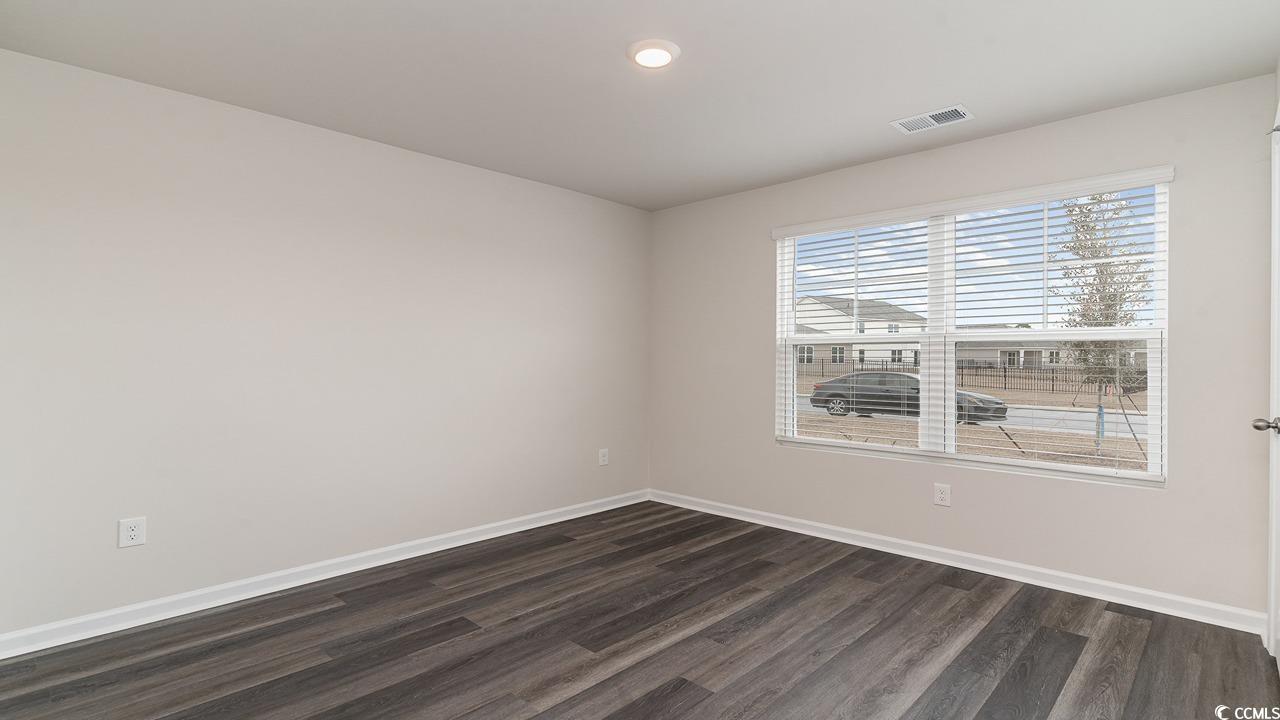 6050 Fuller Rdg Court Conway, SC 29526 - Photo 15 of 22 Walk in closet featuring dark hardwood / wood-styl