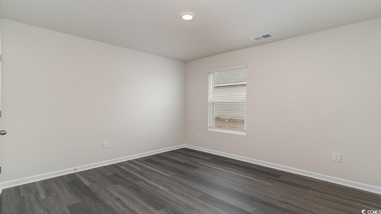 6050 Fuller Rdg Court Conway, SC 29526 - Photo 17 of 22 Unfurnished bedroom with dark hardwood / wood-styl
