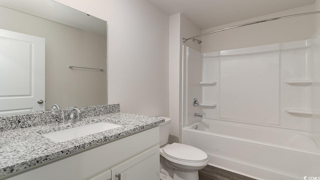 6050 Fuller Rdg Court Conway, SC 29526 - Photo 21 of 22 Unfurnished bedroom with dark hardwood / wood-styl