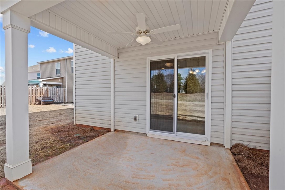 118 Adger Road Pendleton, SC 29670 - Photo 23 of 31 This inviting patio area offers seamless indoor-outdoor living, perfect for enjoying quiet moments or entertaining.