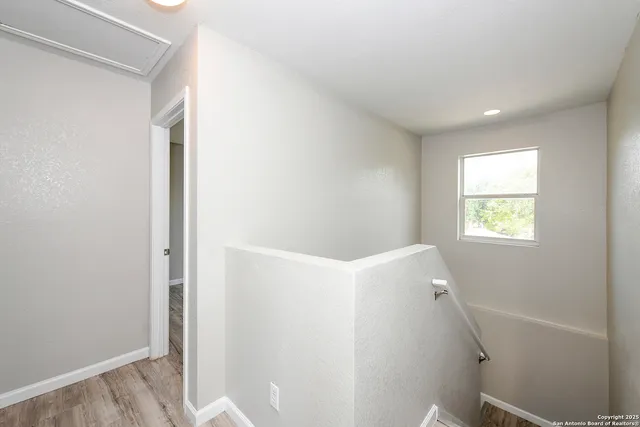 a view of hallway with window