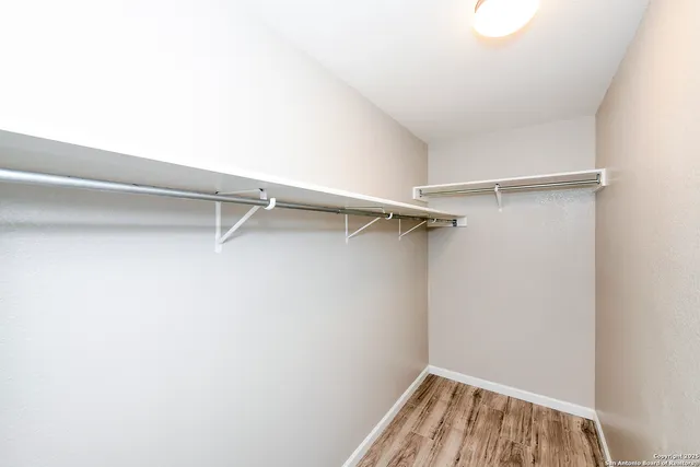 a view of a room with racks on the wall