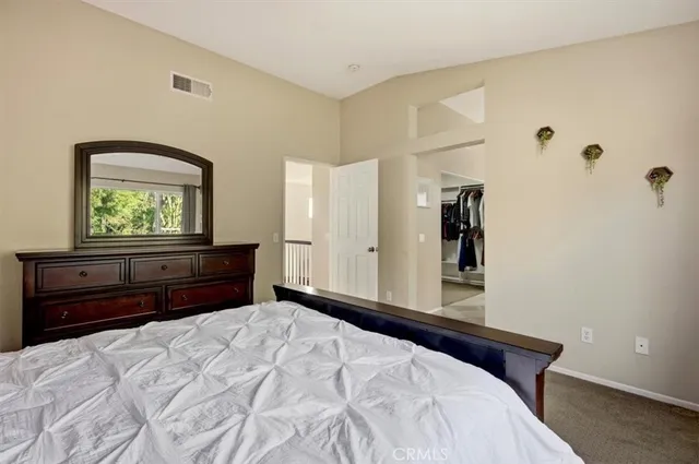 a bathroom with a sink vanity and mirror