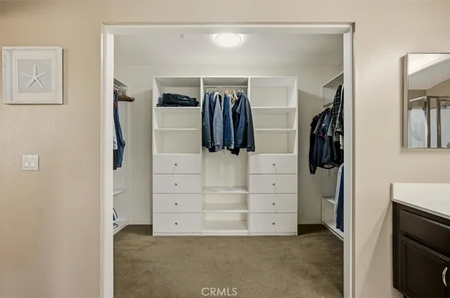 a livingroom with furniture and a chair