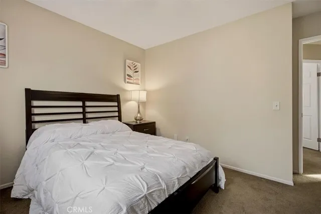 a view of a backyard with sitting area