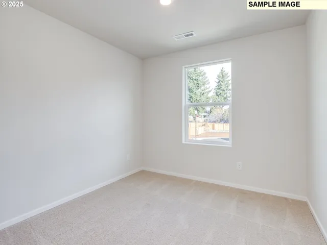 a picture of a room with a white wall