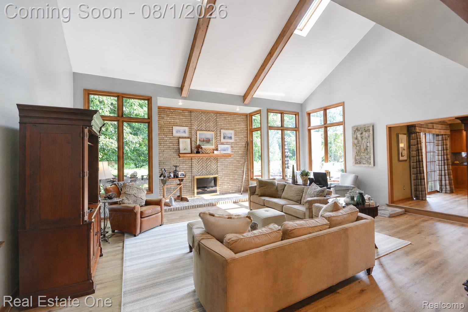 1370 Springwood Lane Rochester, MI 48309 - Photo 5 of 37 Vaulted ceiling with exposed wood beams and skylight