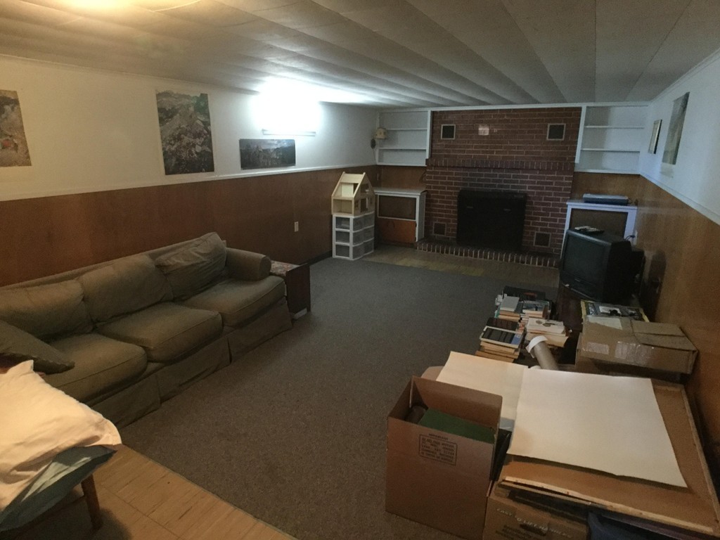 27 Fox Farms Road Northampton, MA 01062 - Photo 11 of 14 a living room with furniture and a flat screen tv