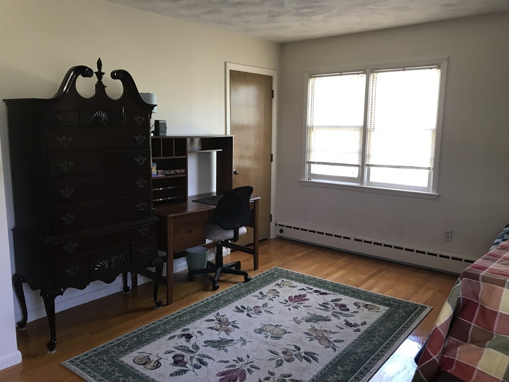 27 Fox Farms Road Northampton, MA 01062 - Photo 8 of 14 a view of a workspace with furniture and a rug