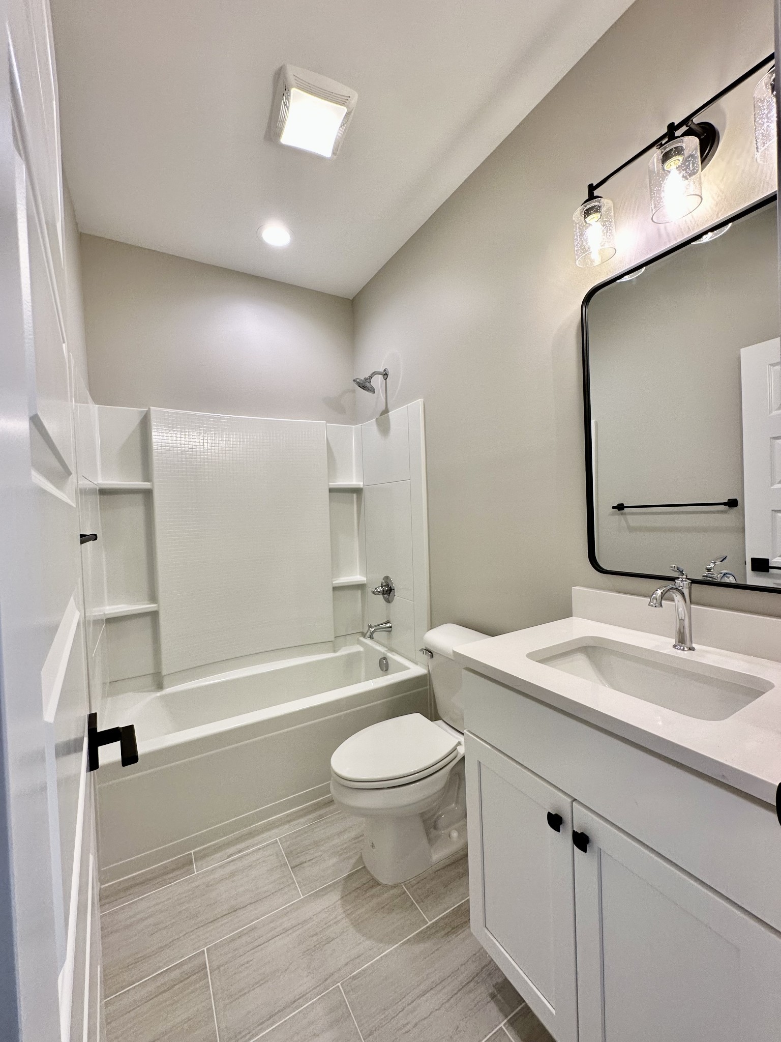 136 Augusta Trail Springfield, TN 37172 - Photo 12 of 31 a bathroom with a sink a toilet and a large mirror