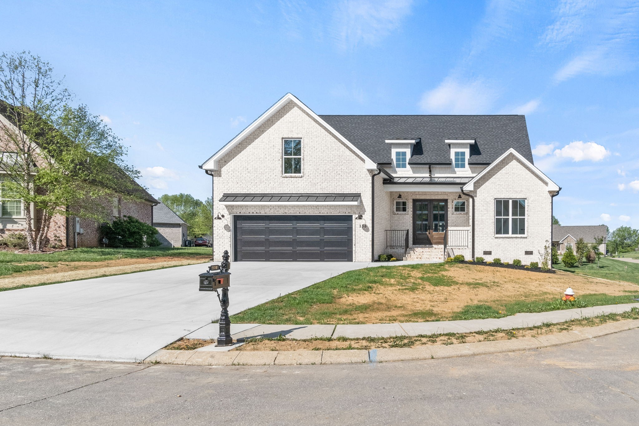 136 Augusta Trail Springfield, TN 37172 - Photo 3 of 31 a view of a house with a yard and garage