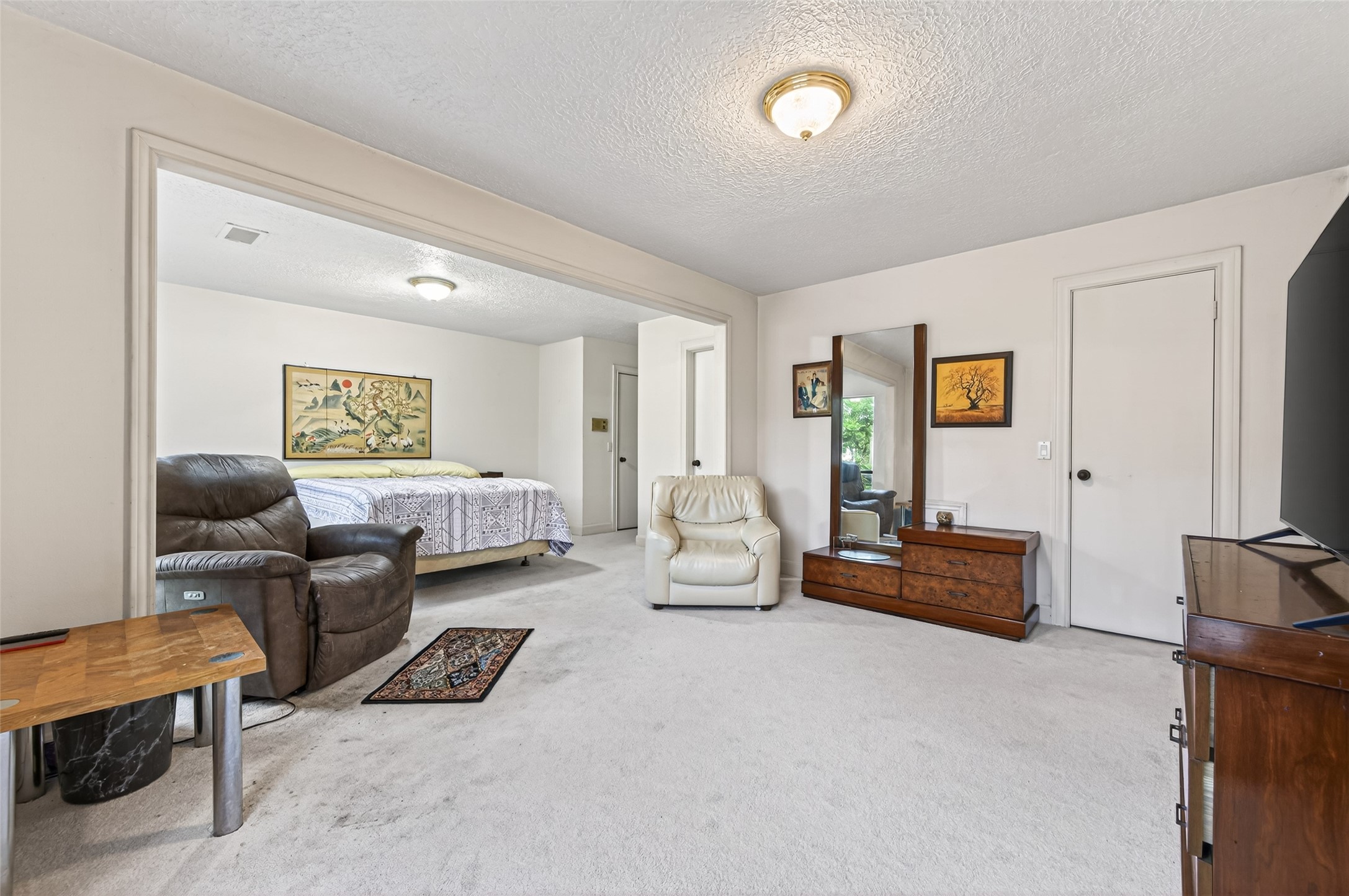 8103 Lake Edge Court Houston, TX 77071 - Photo 35 of 48 Oversized bedroom featuring an adjoining lounge space for added versatility