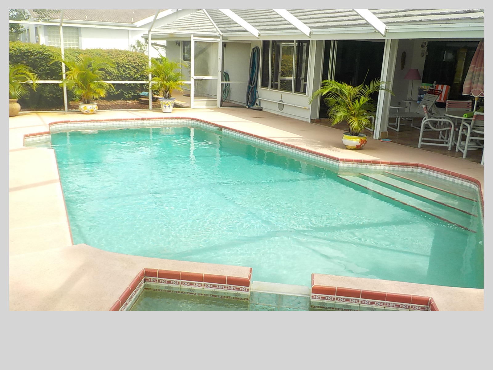 2159 Southeast Erwin Road Port St. Lucie, FL 34952 - Photo 36 of 48 swimming pool view with a outdoor seating