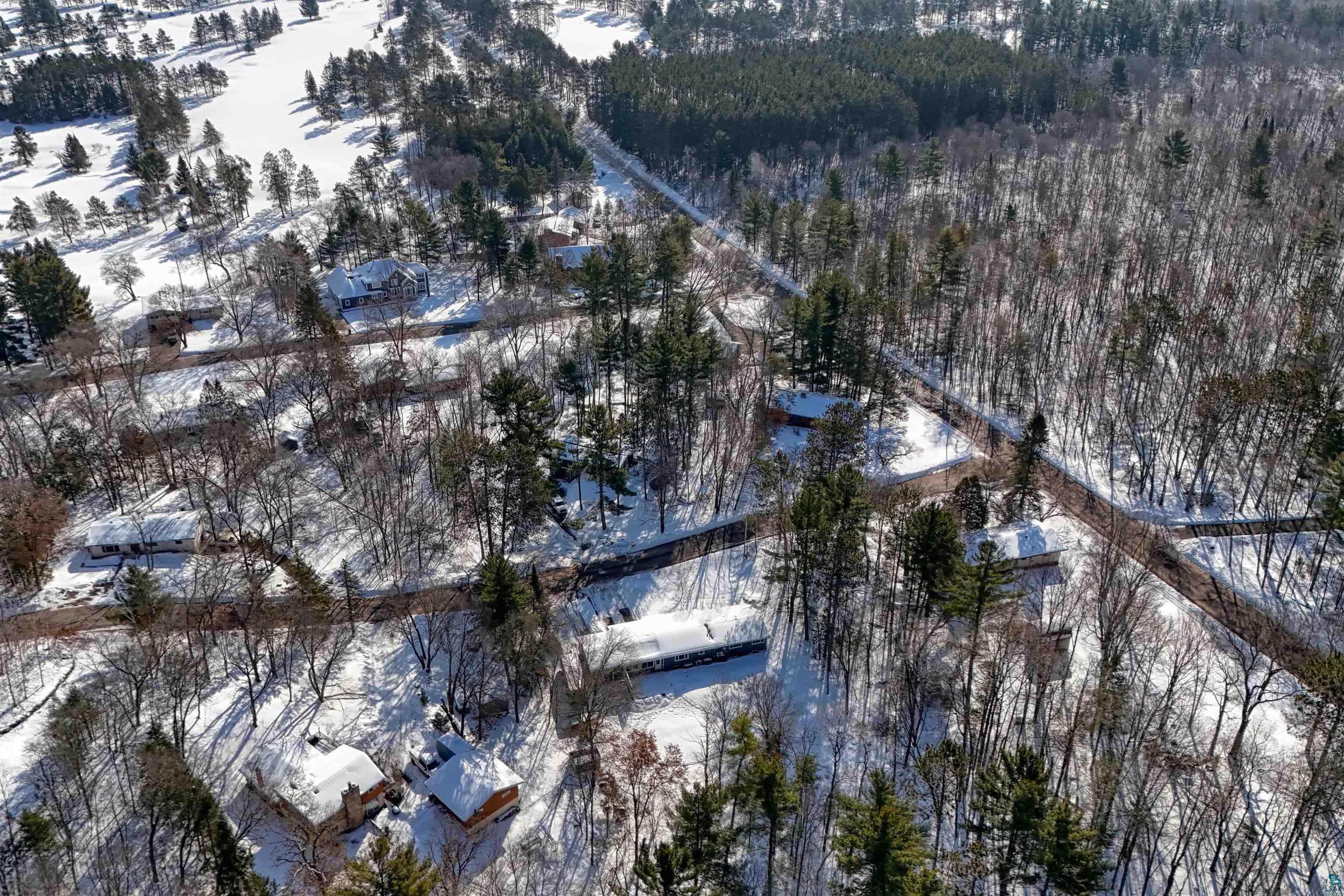 10719 North Oak Ridge Street Hayward, WI 54843 - Photo 4 of 57 View of snowy aerial view
