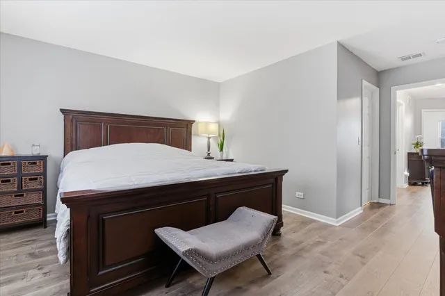 a living room with a furniture and a table