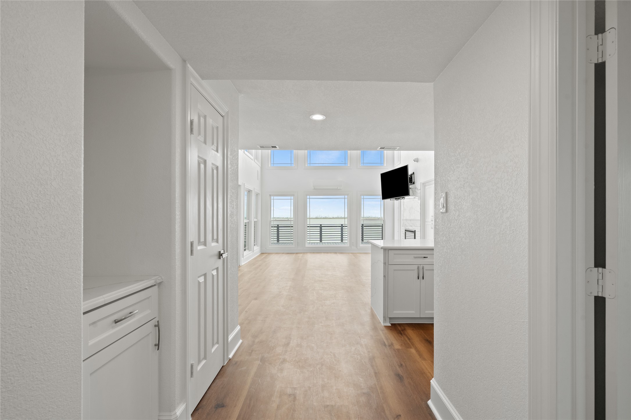 407 Isles End Road Tiki Island, TX 77554 - Photo 17 of 34 a view of a kitchen with a sink and a refrigerator