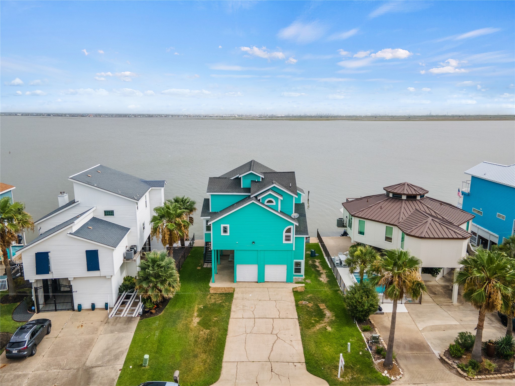 407 Isles End Road Tiki Island, TX 77554 - Photo 20 of 34 an aerial view of a house