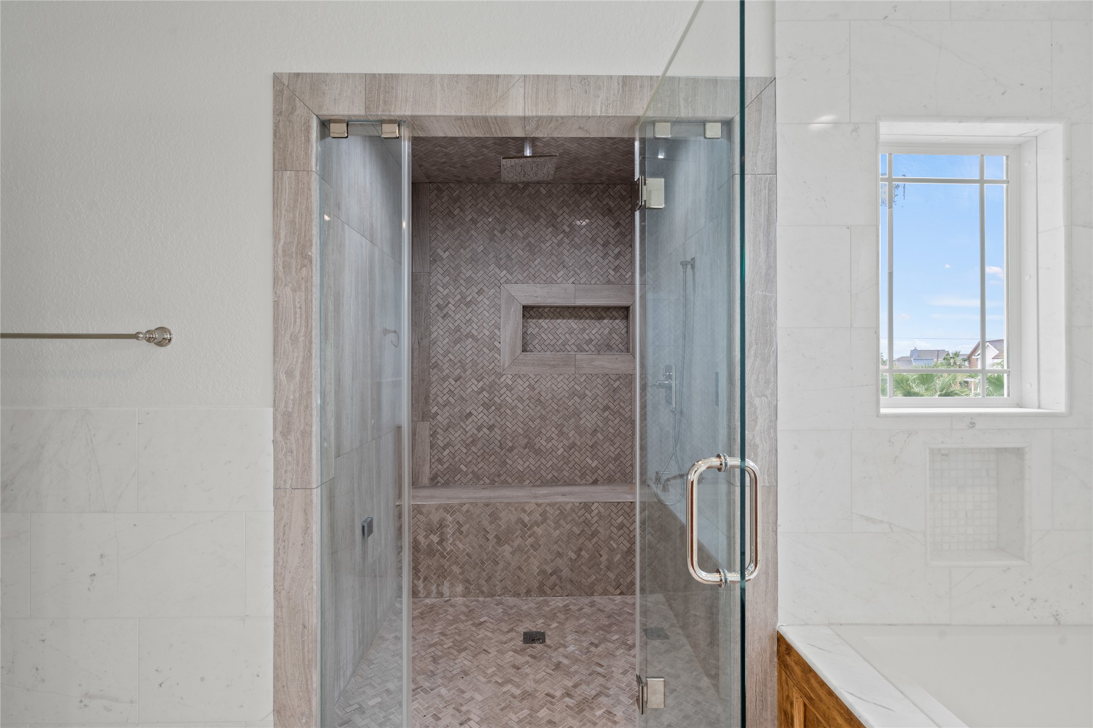 407 Isles End Road Tiki Island, TX 77554 - Photo 31 of 34 a bathroom with a glass shower door