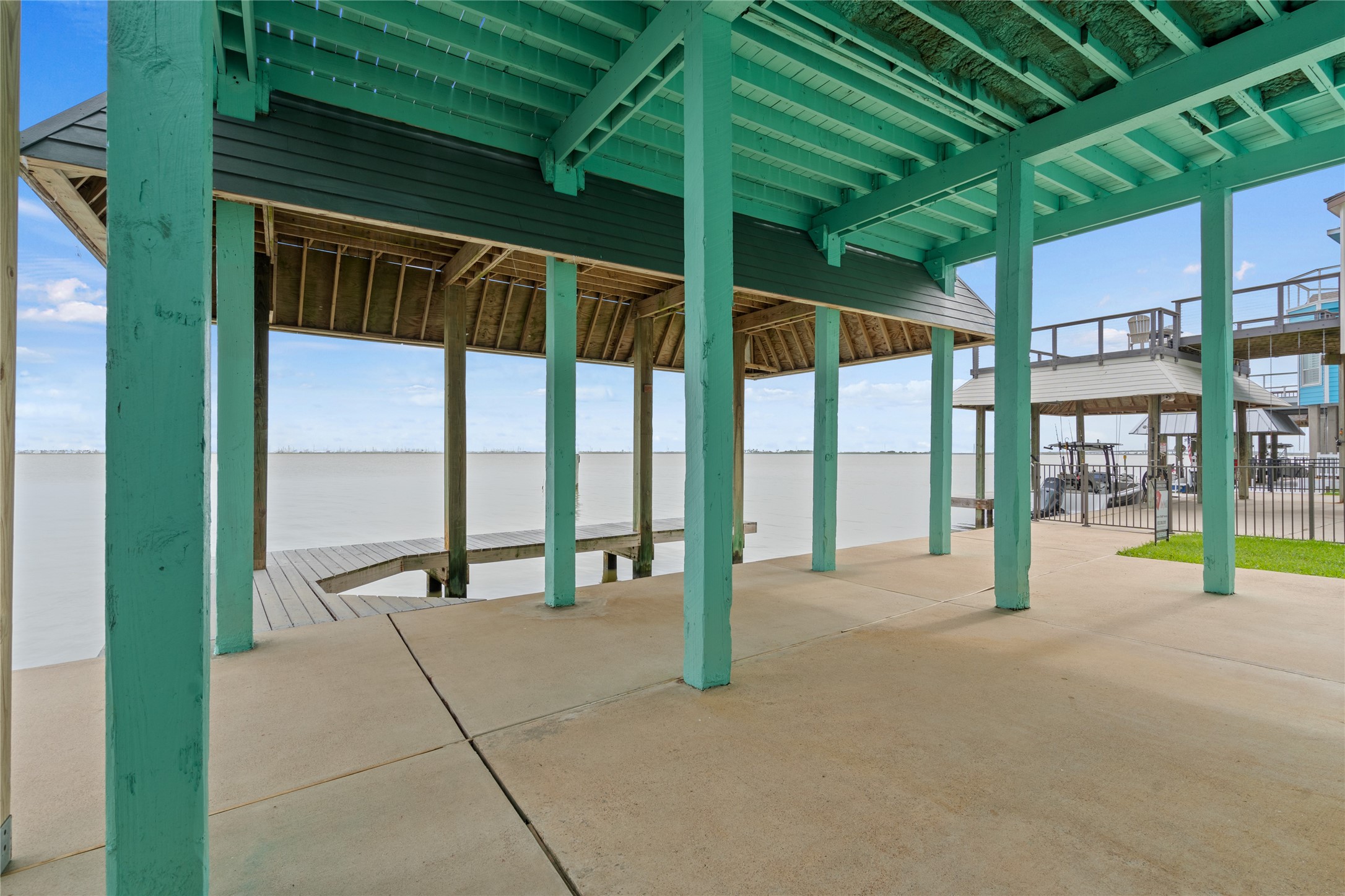 407 Isles End Road Tiki Island, TX 77554 - Photo 34 of 34 a view of porch with a backyard