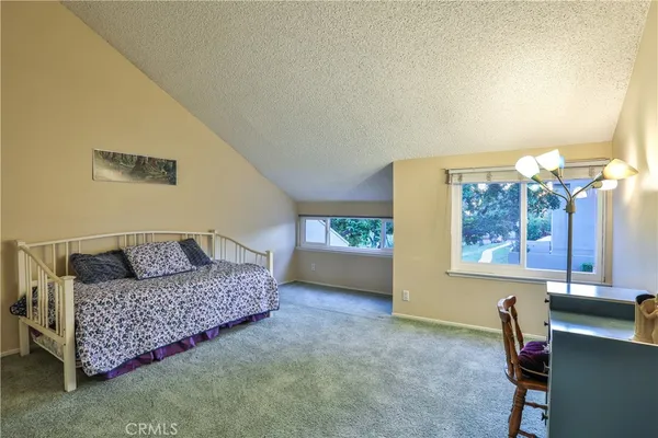 a view of a livingroom with furniture and window