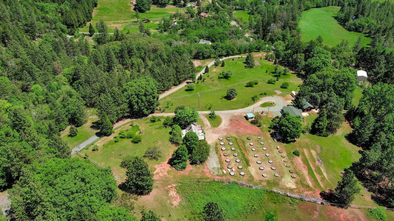 5916 Tunnel Loop Road Grants Pass, OR 97526 - Photo 39 of 65 an aerial view of a house with a yard