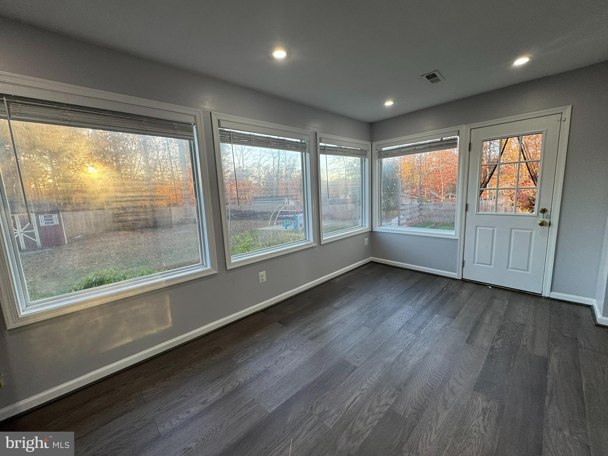 6910 Ontario Street Springfield, VA 22152 - Photo 13 of 44 a view of an empty room with wooden floor and a window