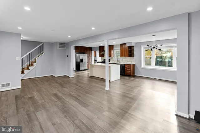 a view of kitchen with furniture and window