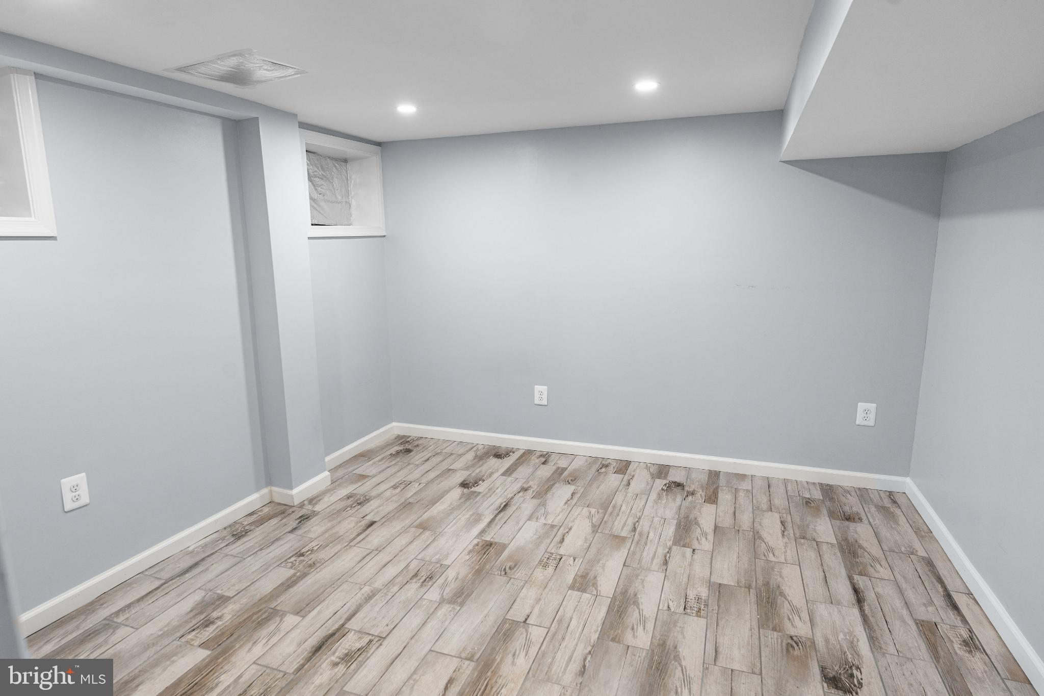 6910 Ontario Street Springfield, VA 22152 - Photo 27 of 44 a view of room with wooden floor