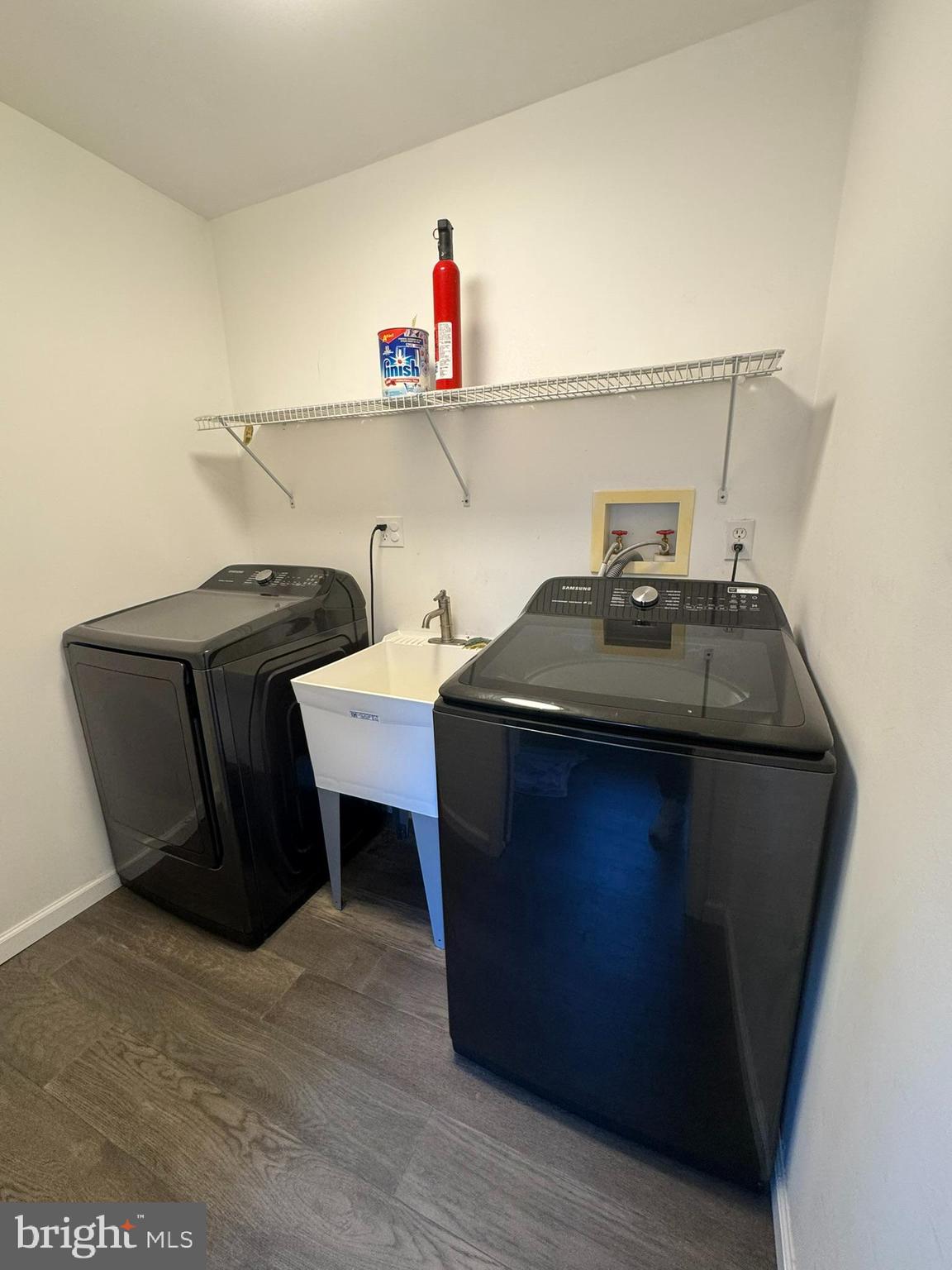 6910 Ontario Street Springfield, VA 22152 - Photo 30 of 44 a room with a sink and cabinets