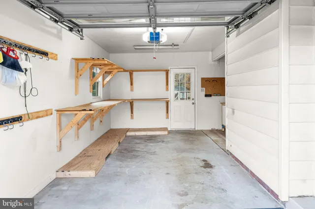 an aerial view of a house with outdoor space