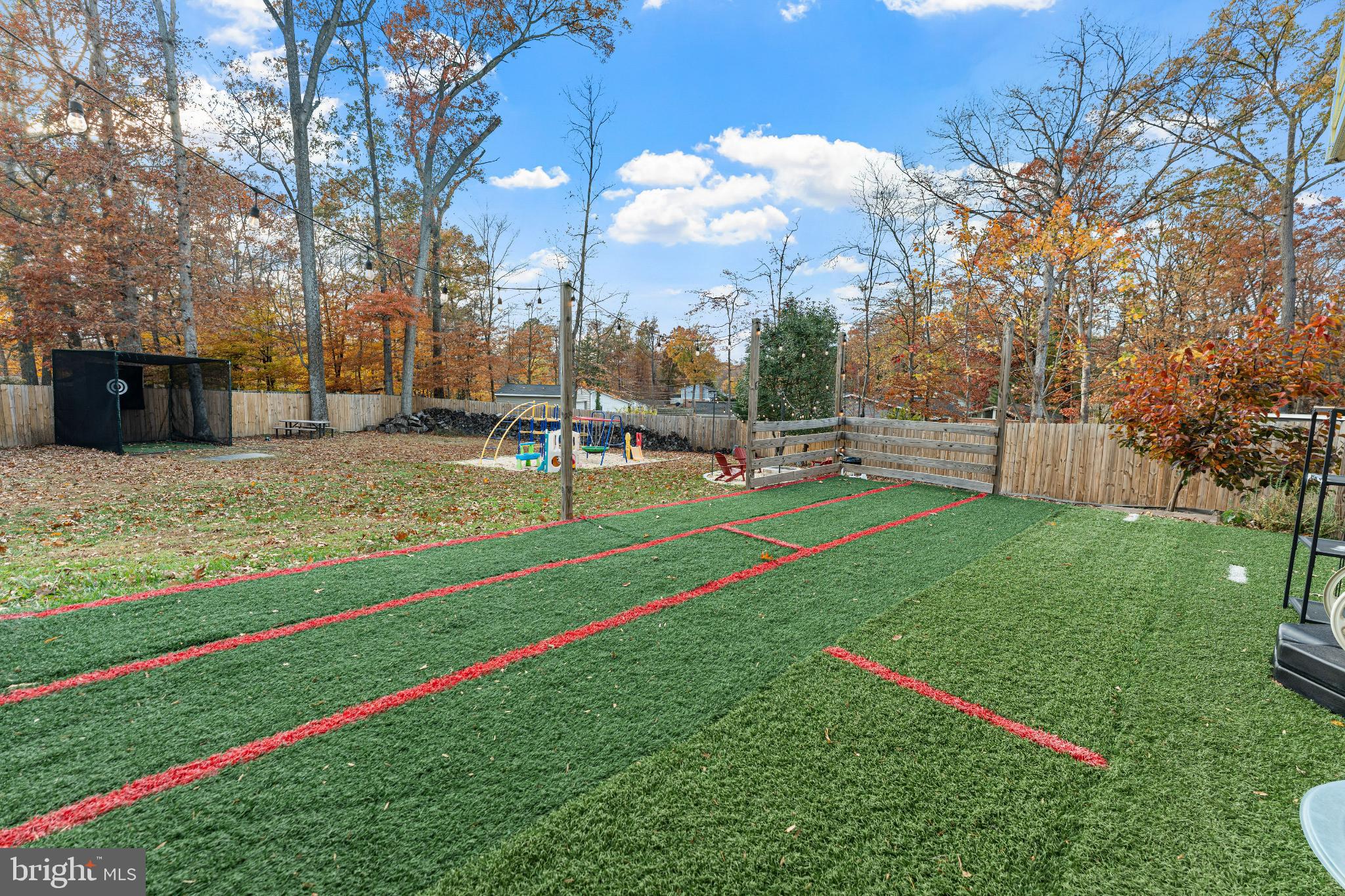 6910 Ontario Street Springfield, VA 22152 - Photo 38 of 44 a view of a park with swings and slides