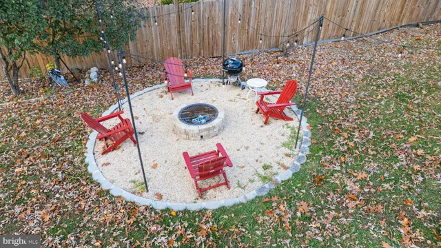 a view of a swimming pool with sitting area