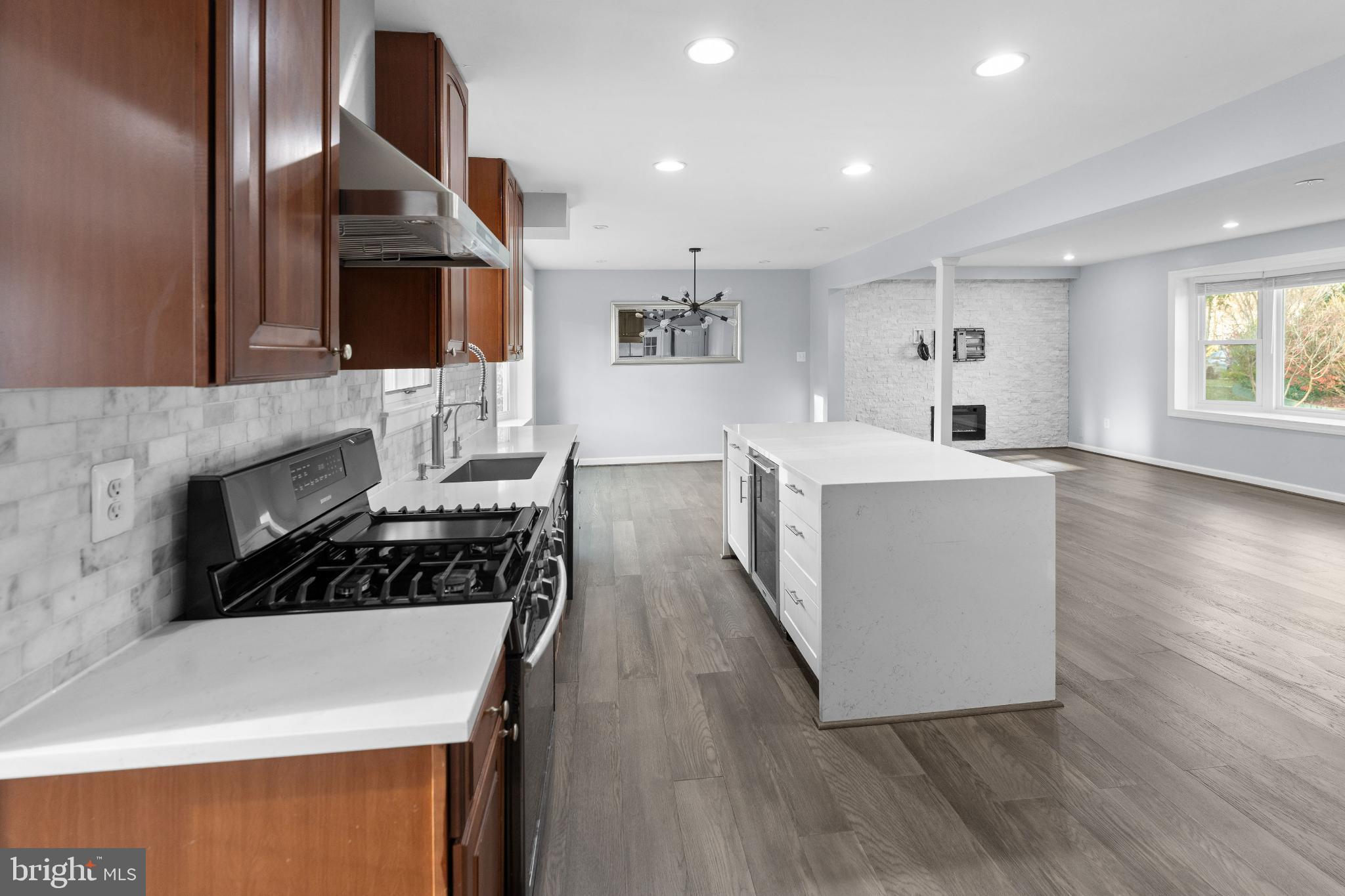 6910 Ontario Street Springfield, VA 22152 - Photo 4 of 44 a living room with furniture and a fireplace