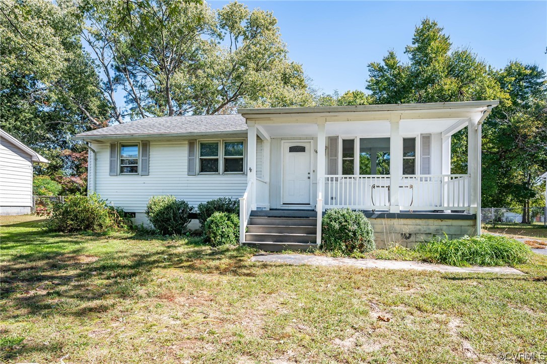 16001 Meridian Avenue Chester, VA 23831 - Photo 1 of 26 front view of a house with a yard