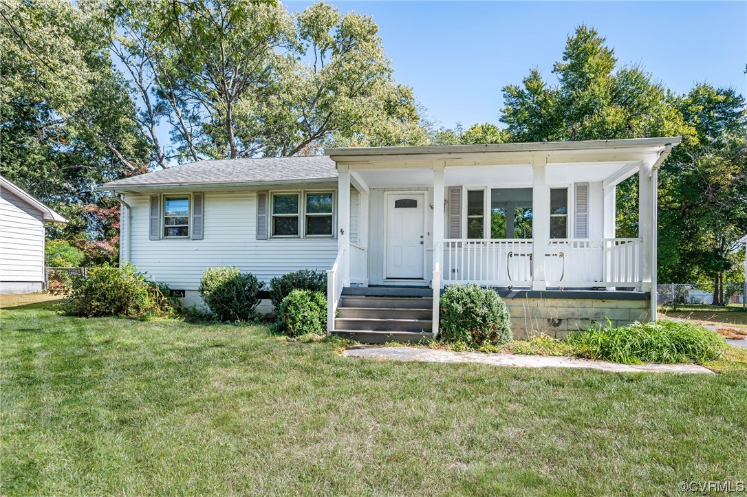 16001 Meridian Avenue Chester, VA 23831 - Photo 2 of 26 front view of a house with a yard