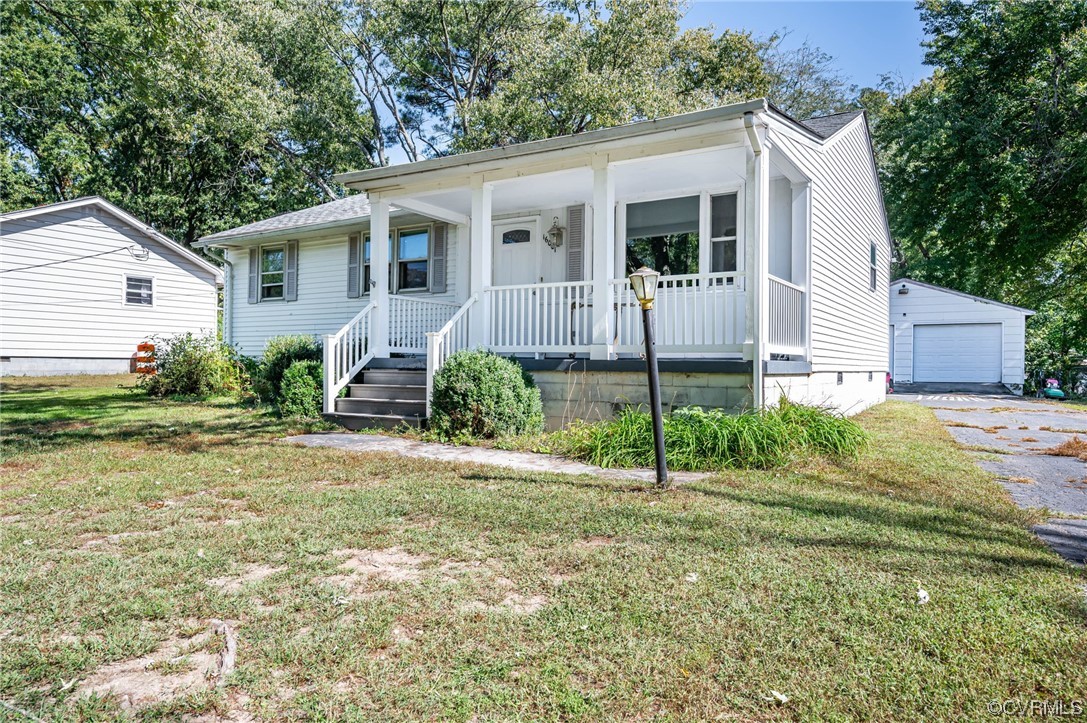 16001 Meridian Avenue Chester, VA 23831 - Photo 4 of 26 a view of a house with backyard and a garden