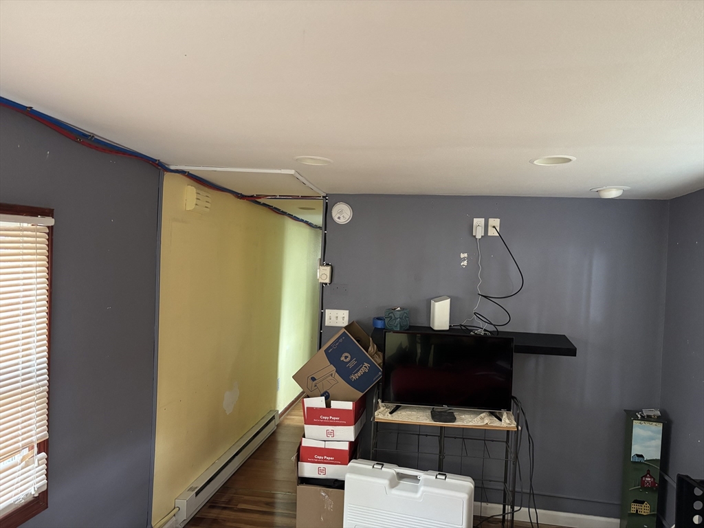 80 Better Way Springfield, MA 01119 - Photo 7 of 11 a workspace with furniture and lamp