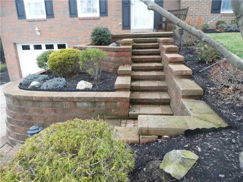 218 Wyngate Road Coraopolis, PA 15108 - Photo 2 of 16 Exterior Front. CUSTOM OMNISTONE WALKWAYS AND RETAINING WALLS PROVIDES A SPECIAL IMPRESSION TO FAMILY AND FRIENDS.