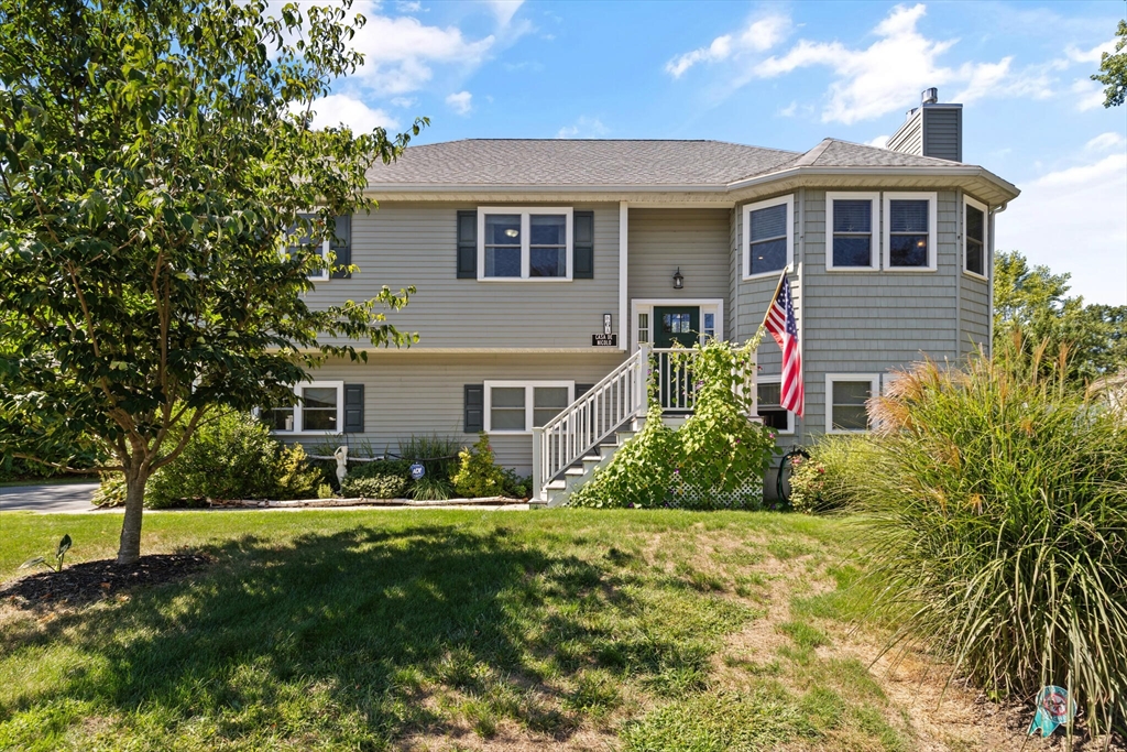 6 Ferry Road, Unit A Salisbury, MA 01952 - Photo 1 of 28 a front view of house with yard and green space