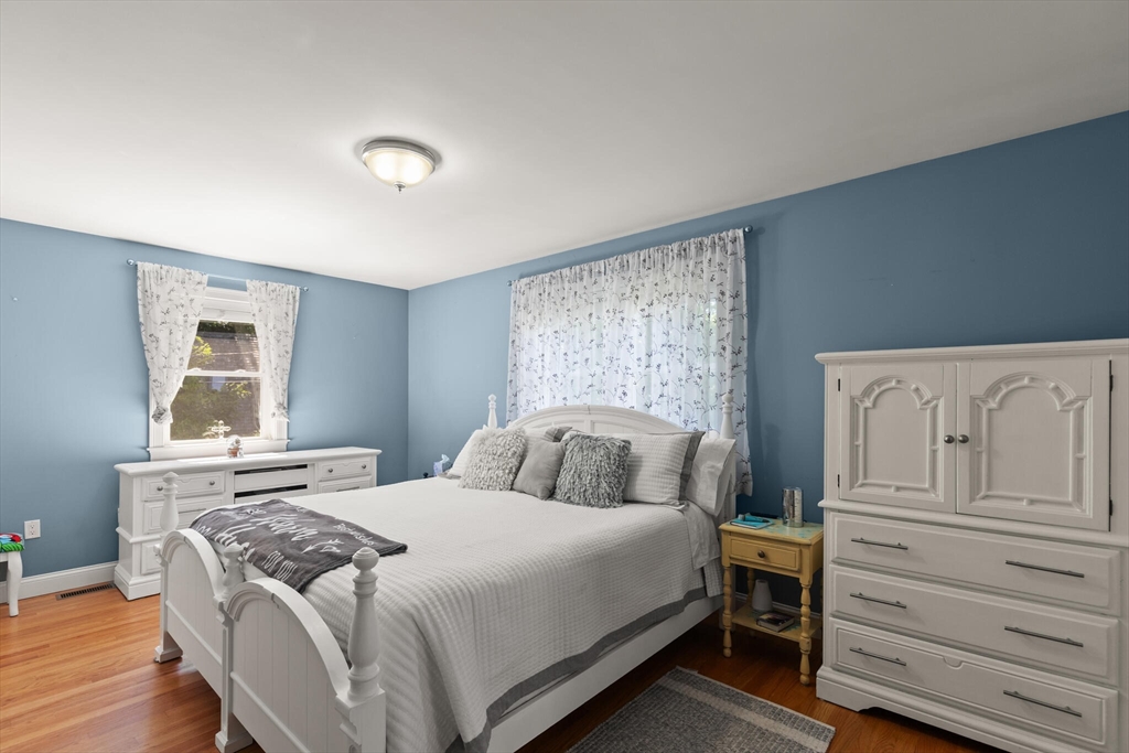6 Ferry Road, Unit A Salisbury, MA 01952 - Photo 14 of 28 a bedroom with a bed and a window