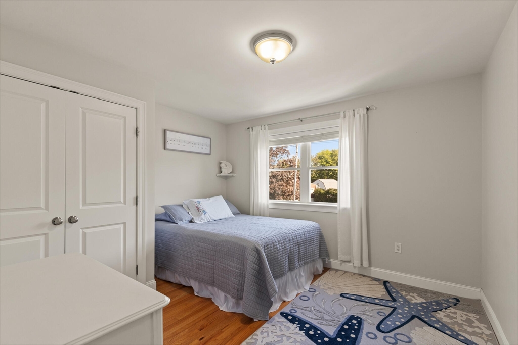 6 Ferry Road, Unit A Salisbury, MA 01952 - Photo 16 of 28 a bedroom with a bed and a window