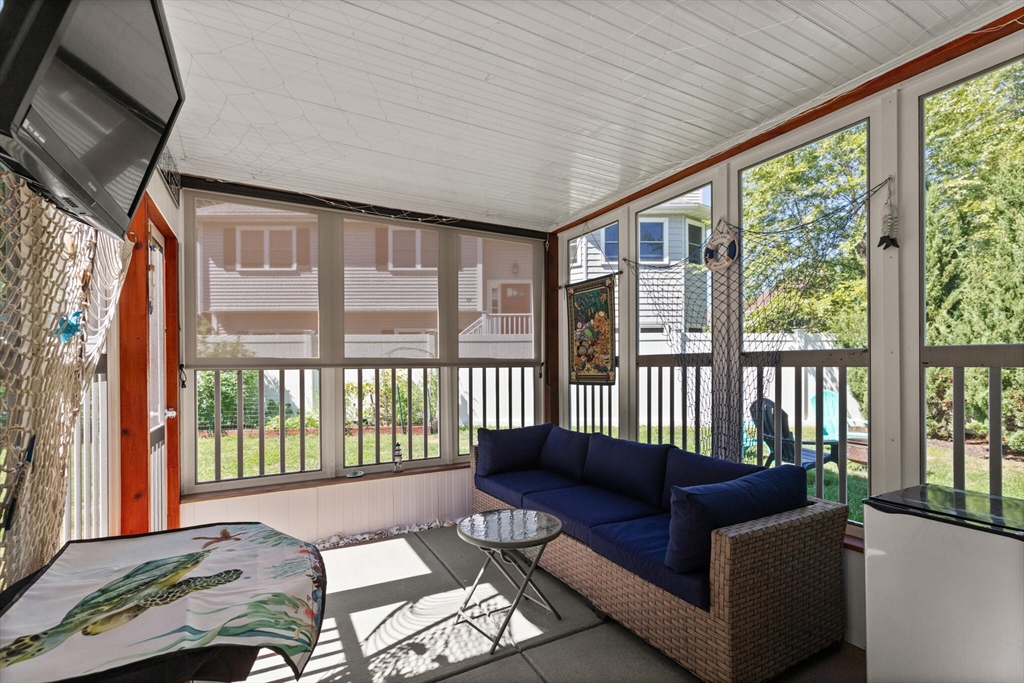 6 Ferry Road, Unit A Salisbury, MA 01952 - Photo 21 of 28 a living room with furniture and a large window