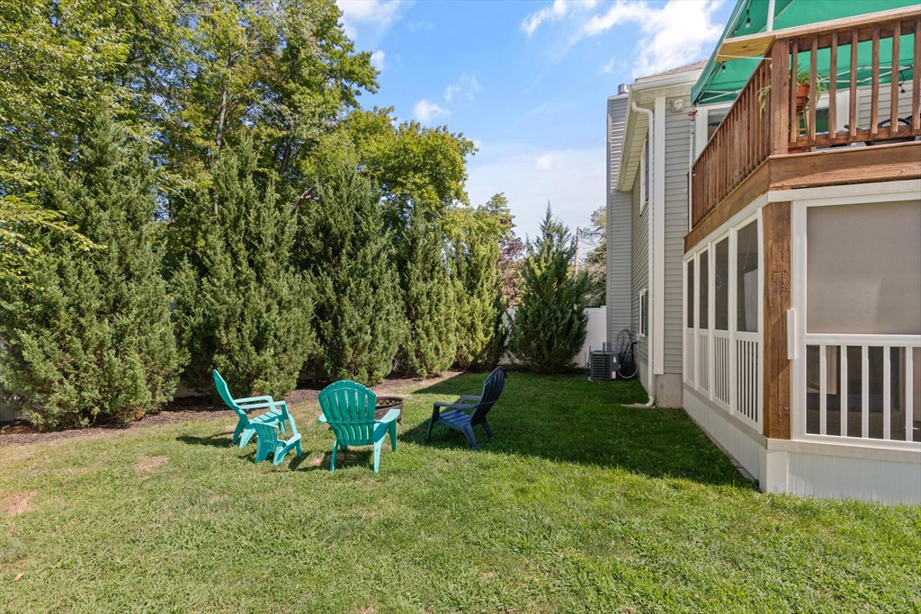 6 Ferry Road, Unit A Salisbury, MA 01952 - Photo 25 of 28 a view of a chair and table in backyard of the house