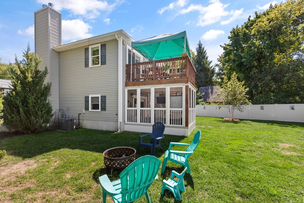 6 Ferry Road, Unit A Salisbury, MA 01952 - Photo 26 of 28 a view of a house with backyard sitting area and garden