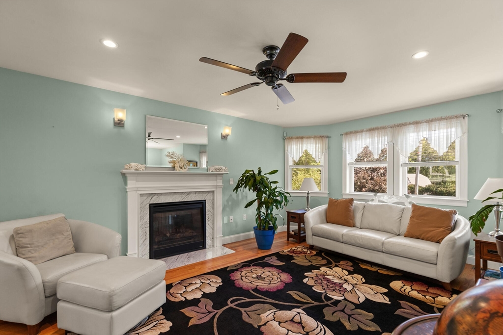 6 Ferry Road, Unit A Salisbury, MA 01952 - Photo 3 of 28 a living room with furniture and a fireplace