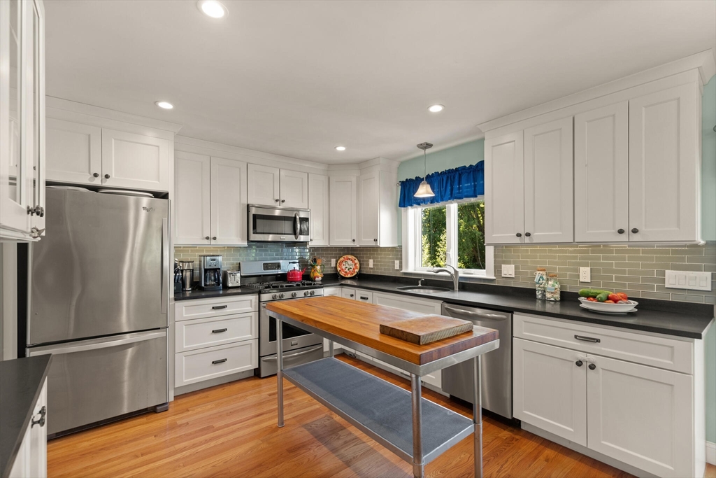 6 Ferry Road, Unit A Salisbury, MA 01952 - Photo 10 of 28 a kitchen with stainless steel appliances a refrigerator sink and cabinets