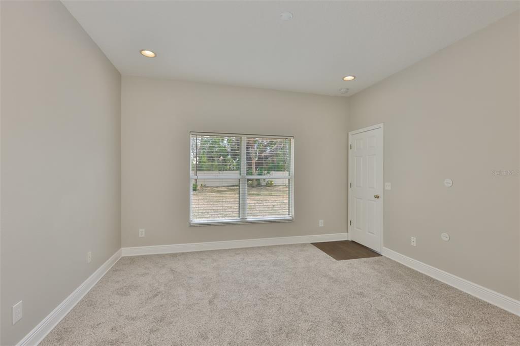 708 Coade Stone Drive Seffner, FL 33584 - Photo 29 of 48 an empty room with a window