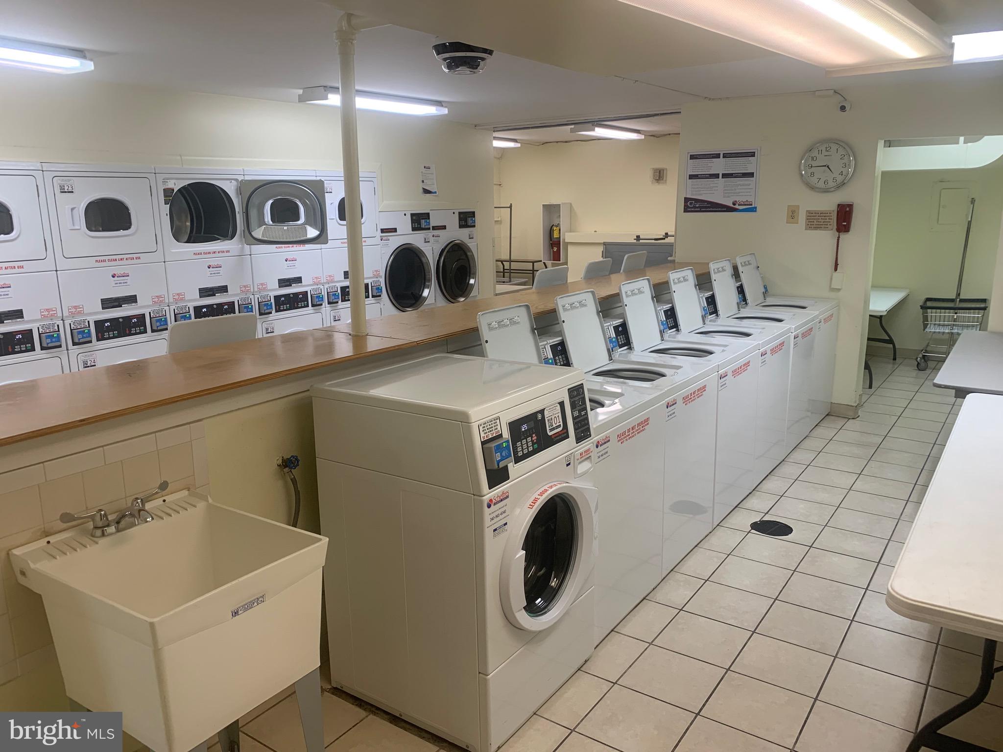 1111 University Boulevard West, Unit 1406A Silver Spring, MD 20902 - Photo 23 of 25 Laundry Room