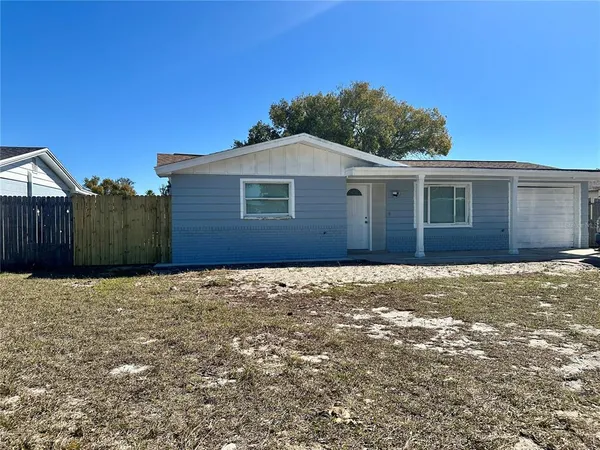 a view of a back yard of the house